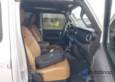 2023 Jeep Wrangler 4Xe Sahara 4X4 z USA, uszkodzony, nr VIN 1C4JJXP67PW524452